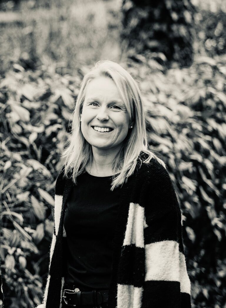 Corporate black and white headshot of Helen Rowell, owner of Stretch Consulting Hr Solutions